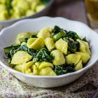 Orecchiette con crema di fave e cicoria saltata